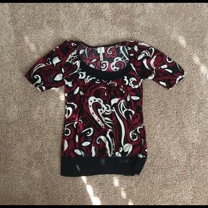 Dress shirt- red, cream, and black.