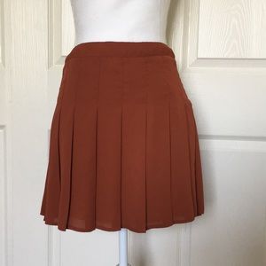 Burn orange pleated skirt