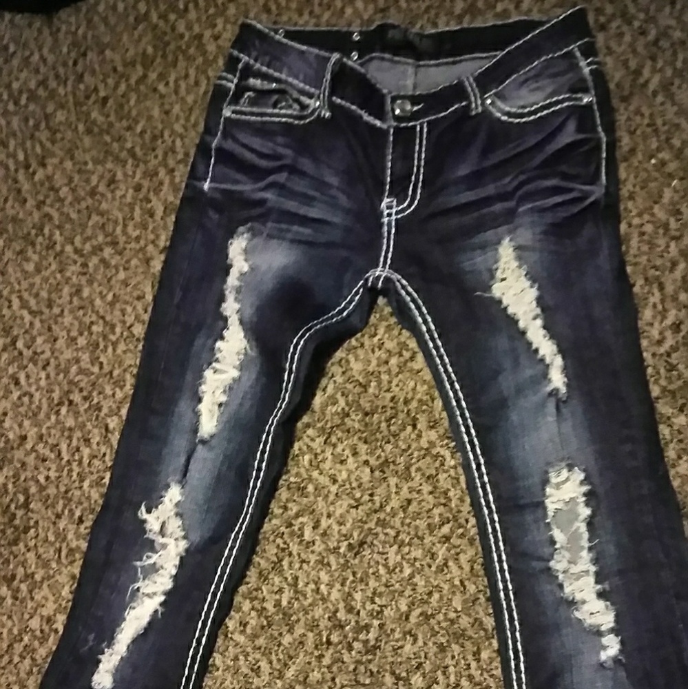 Ripped Ladies jeans .