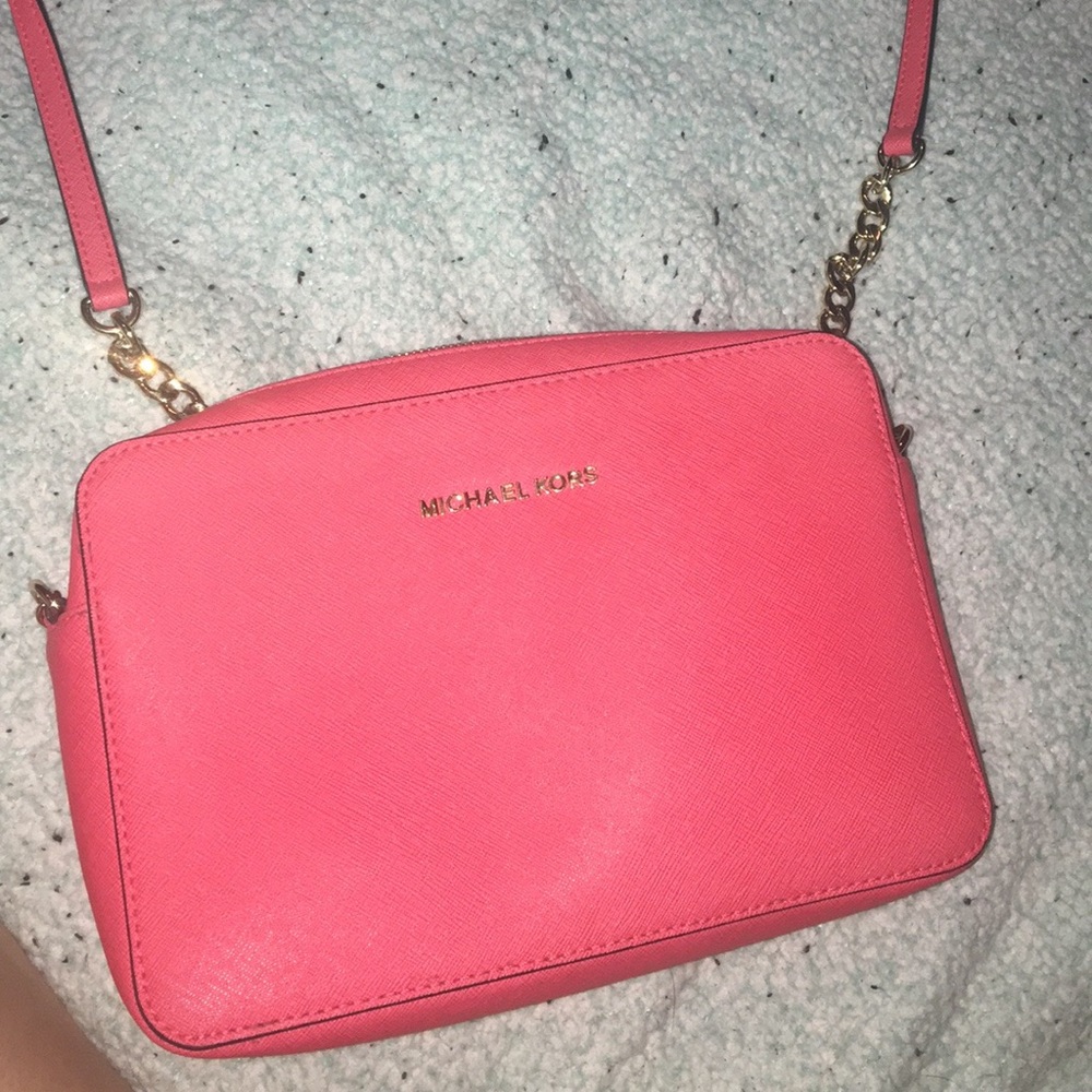 Michael Kors crossbody its reddish orange