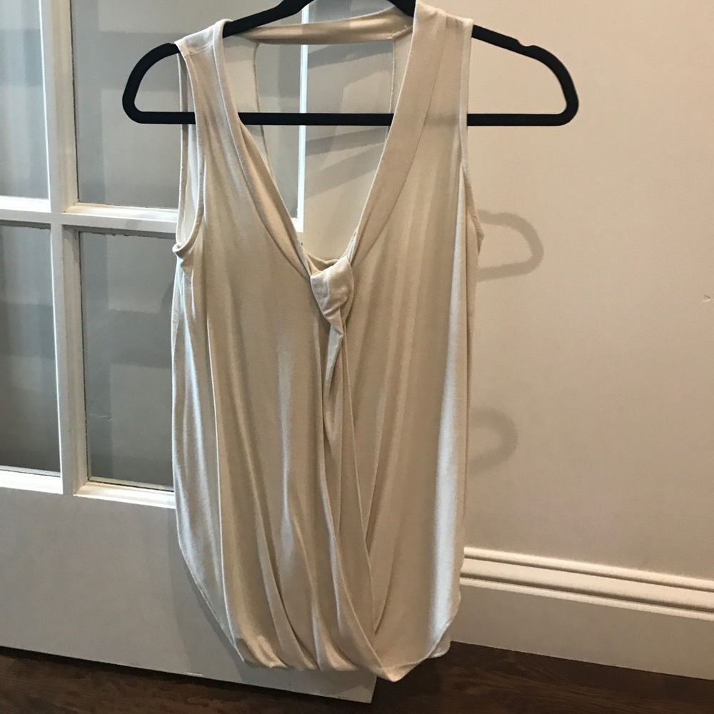 Ivory sleeveless too