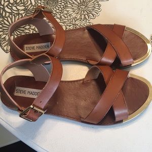 Tan Steve Madden sandals.