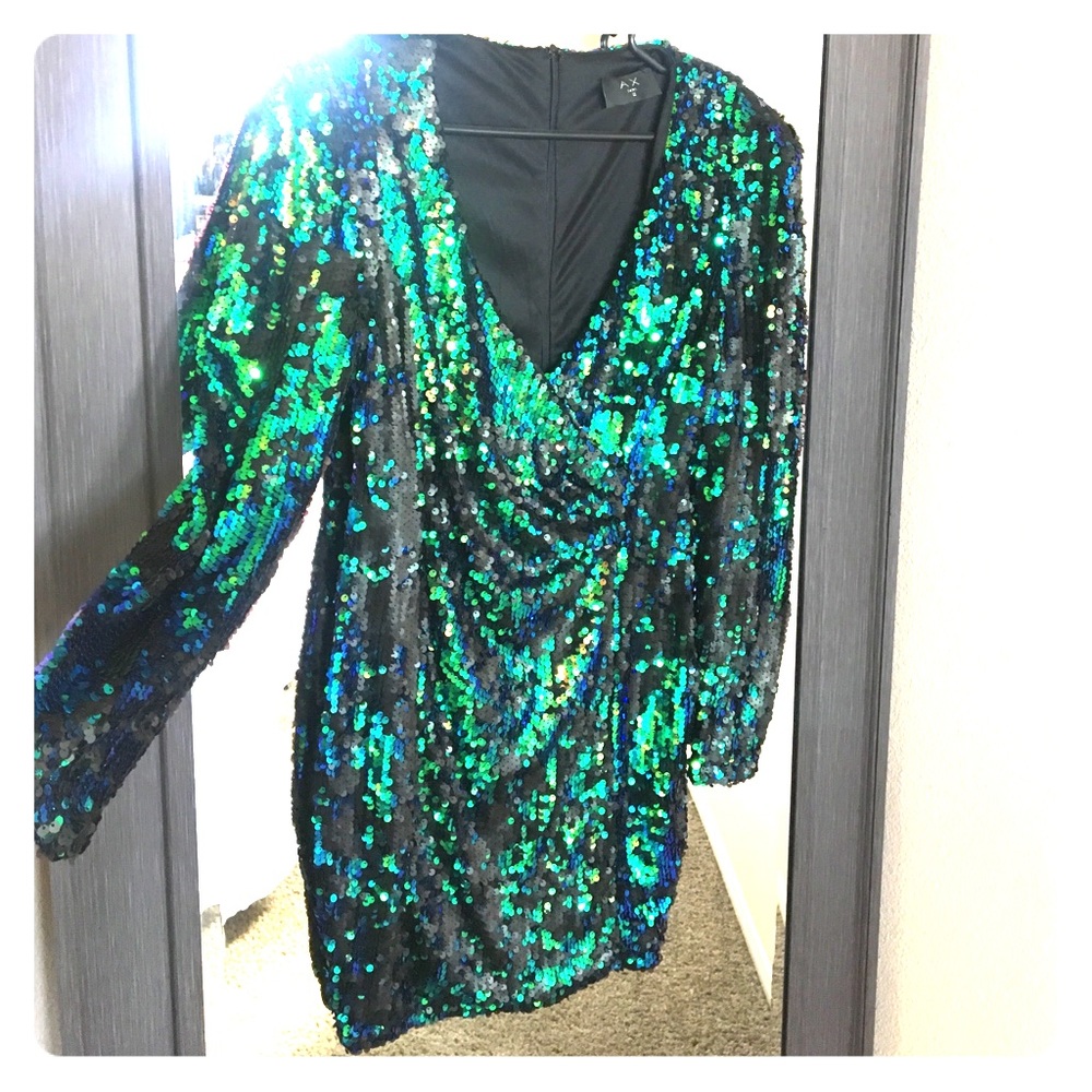 Showstopper! Iridescent green-teal sequin dress