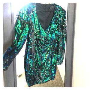 Showstopper! Iridescent green-teal sequin dress