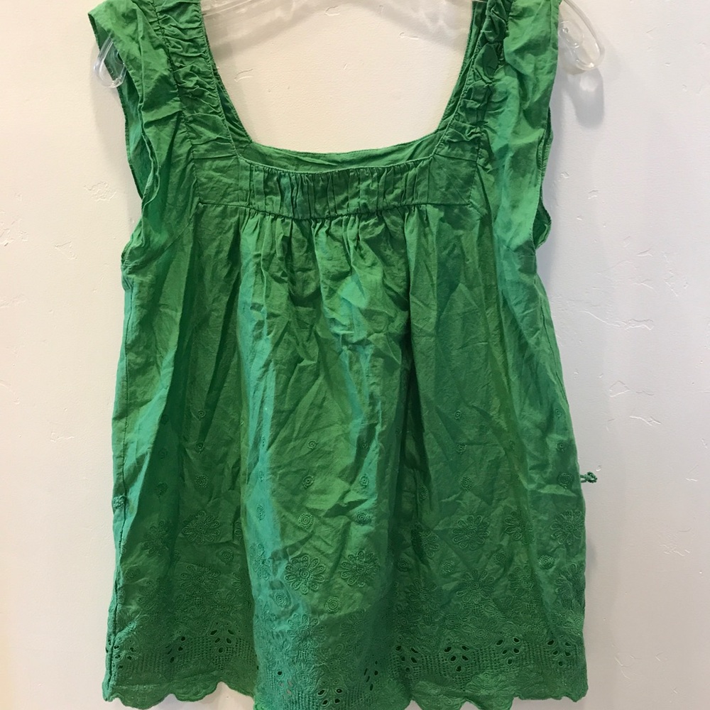 Green sleeveless blouse