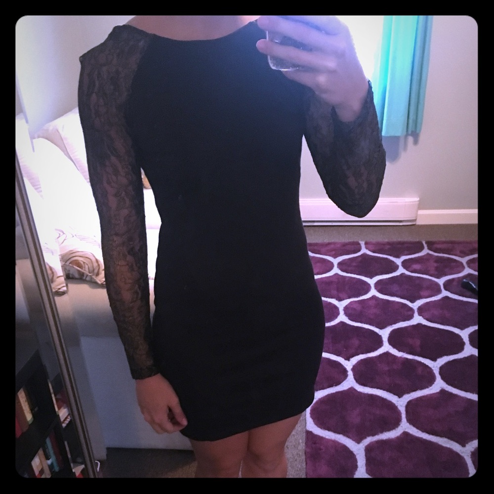 Black bodycon dress with lace sleeves