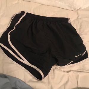 Black and white nike running shorts