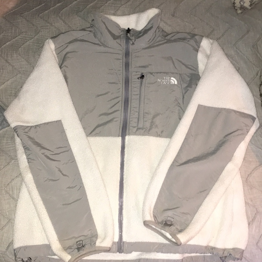 Gray and white North Face Denali