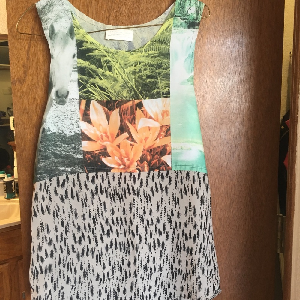 Zara top with unique graphic designs!