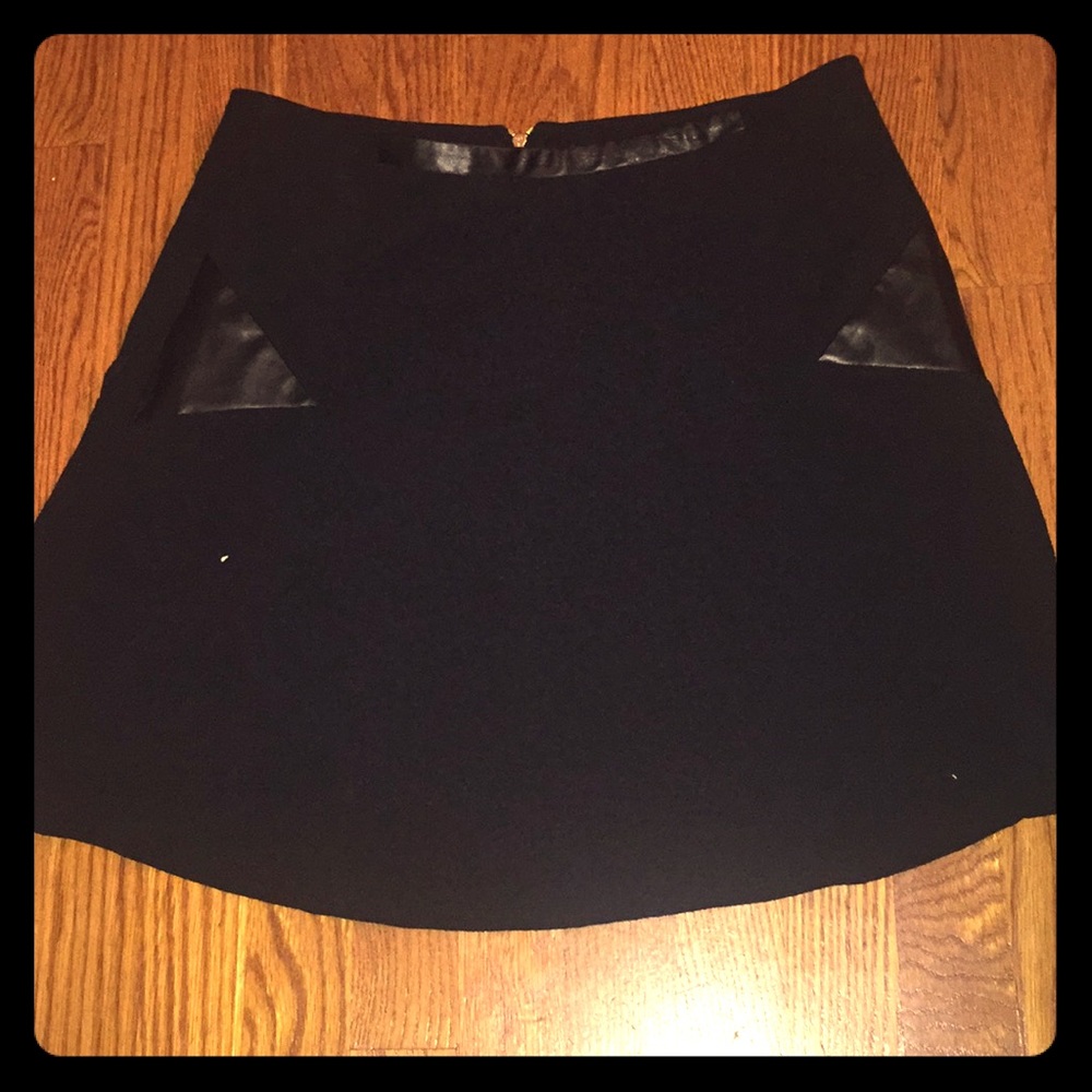 Black Vince Camuto skirt with leather accents