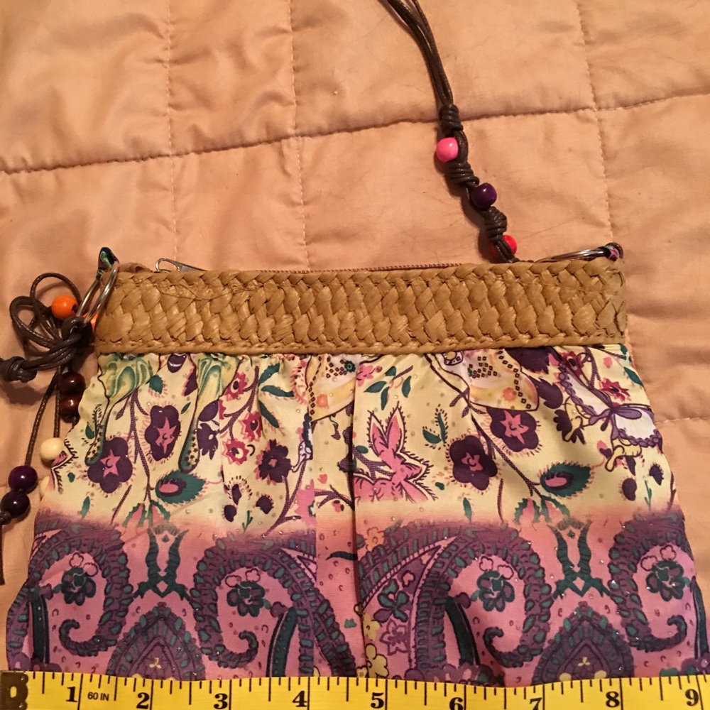 Boho Beaded accents crossbody mini clothe purse.