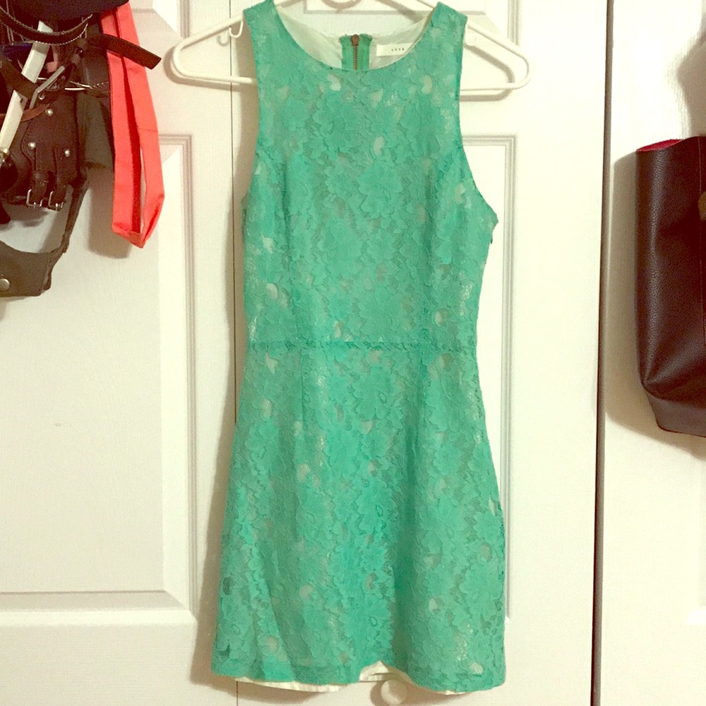 Green and white lace dress form fitting