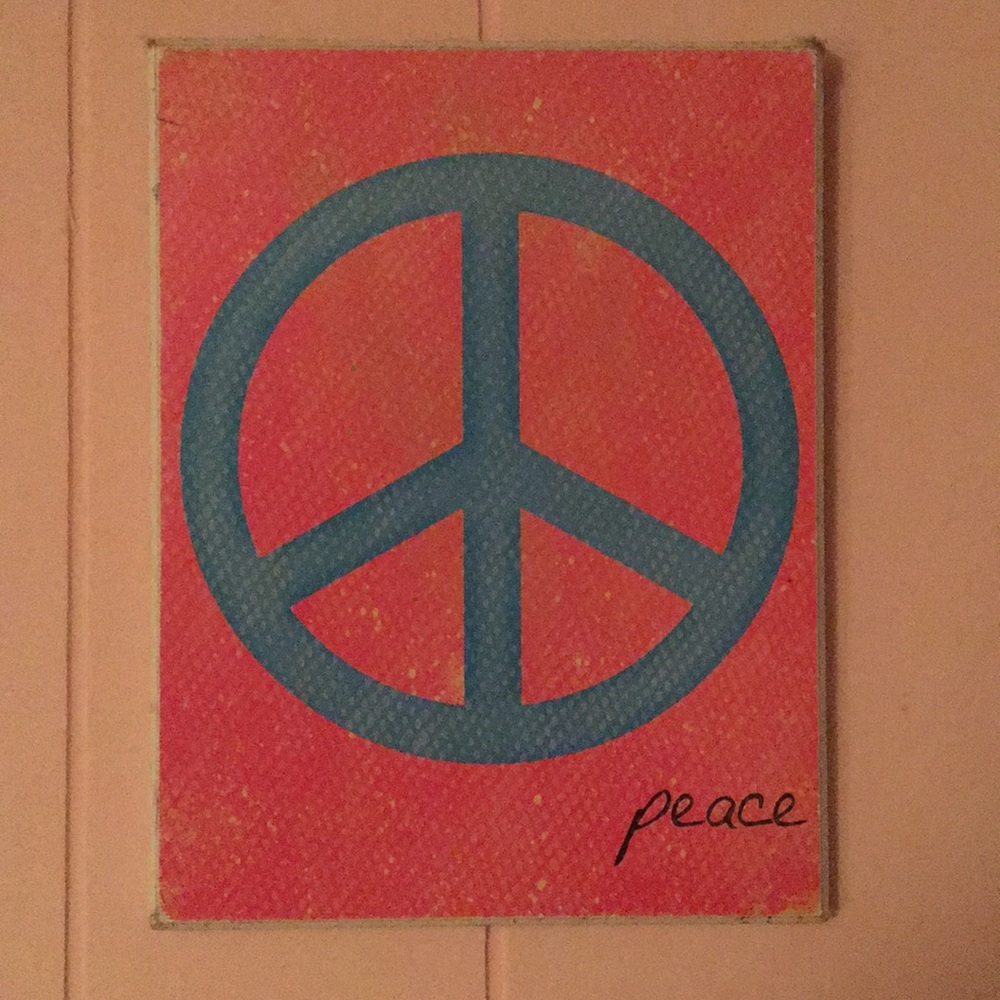 Pink and blue peace sign