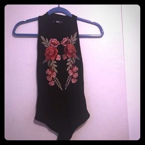 Never worn mock neck racerback bodysuit.
