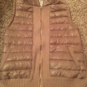 Tan zip up vest with tribal print back