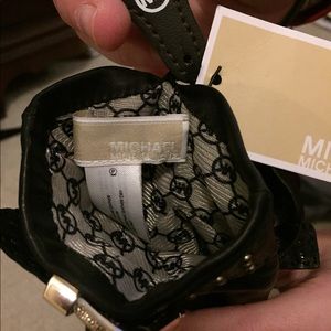 Michael Kors leather gloves.