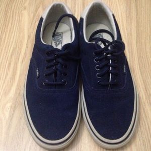 Navy blue suede with off white suede at the heels