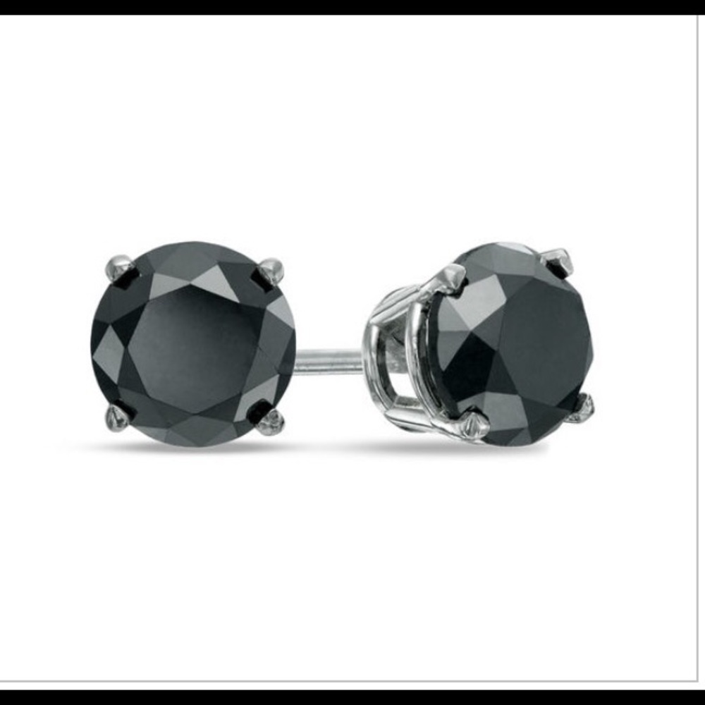 4.00 Carat black diamond solitaire stud earrings.