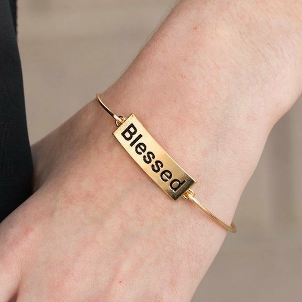 Gold bangle bracelet with blessed message