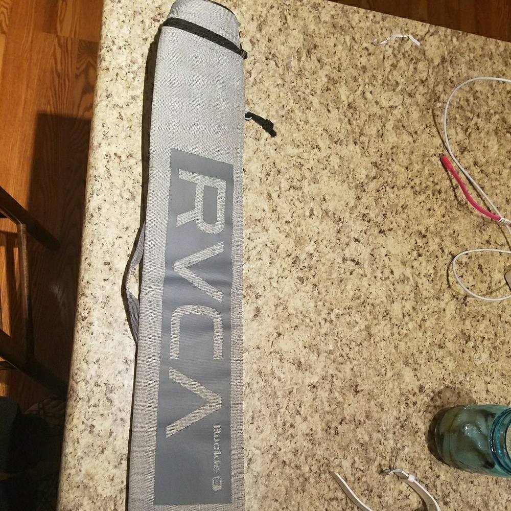 RVCA can cooler with strap. BUCKLE
