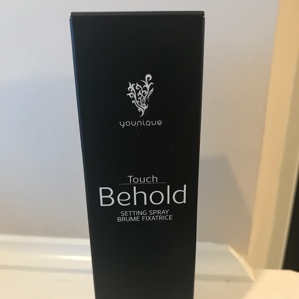 Younique behold finish setting spray.