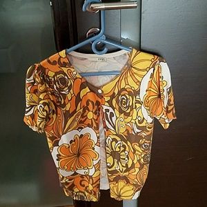 Beautiful, light knitted top. Fits size 4 to 6