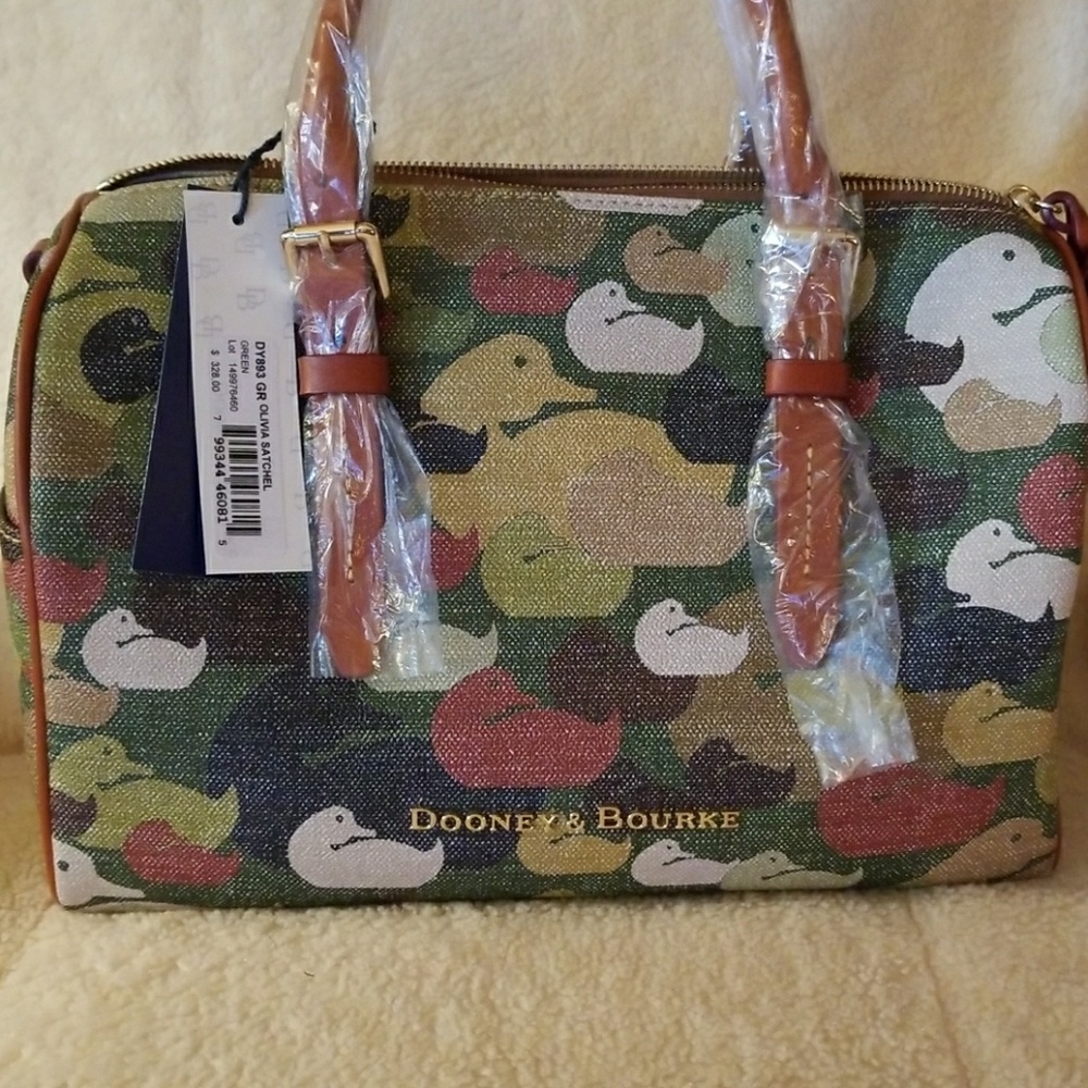 Sold dooney and bourke camo duck Olivia