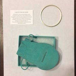 Tiffany & Co. "I Love You" bangle bracelet.