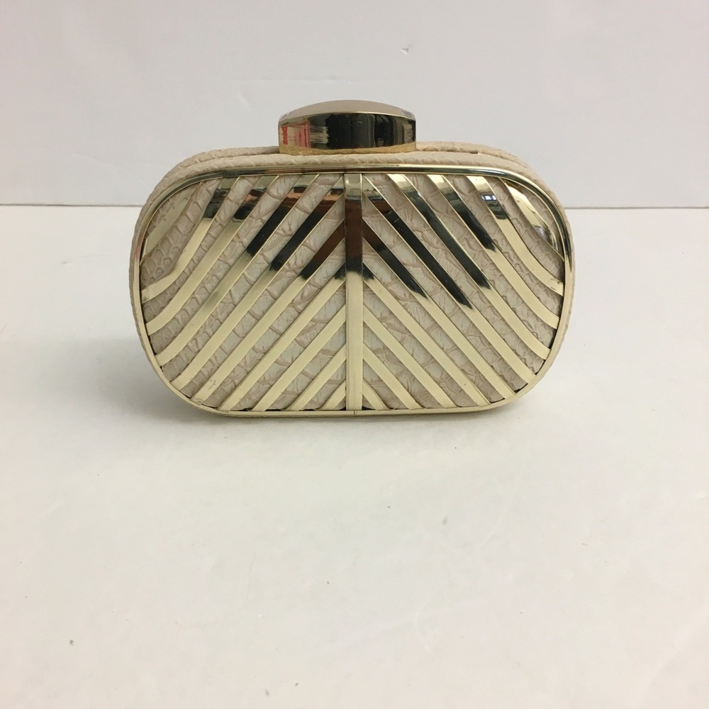 Gold and croc clutch