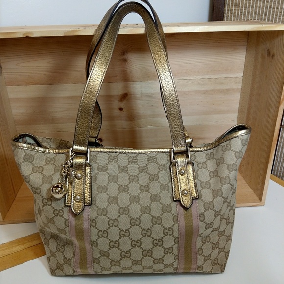 Gucci Handbags - GUCCI 😍 AUTHENTIC GOLD/PINK TOTE!!!