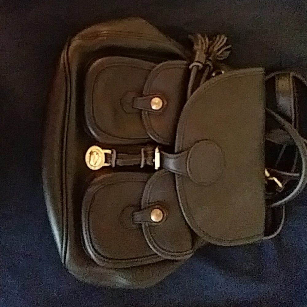 Dooney and burk letter small back pack purse