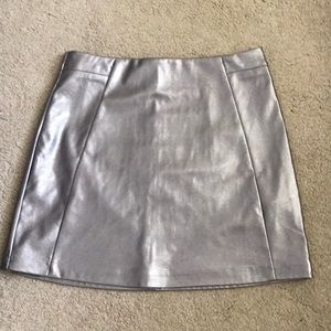 Faux leather mini skirt. Metallic silver Faux leather mini skirt. Metallic silver