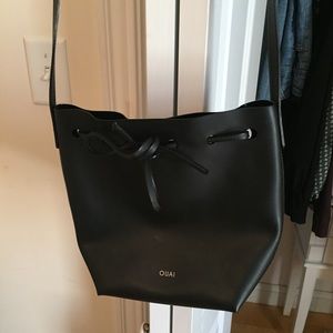 Black faux leather bucket bag