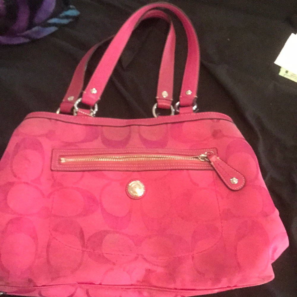 Pink coach I love it a lot don't use it that much