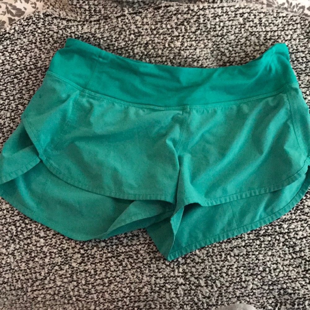 lululemon size 4 speed shorts! Teal/Sea foam green