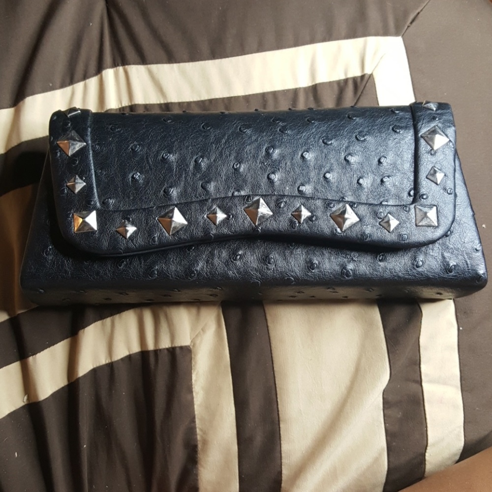 Black studded clutch