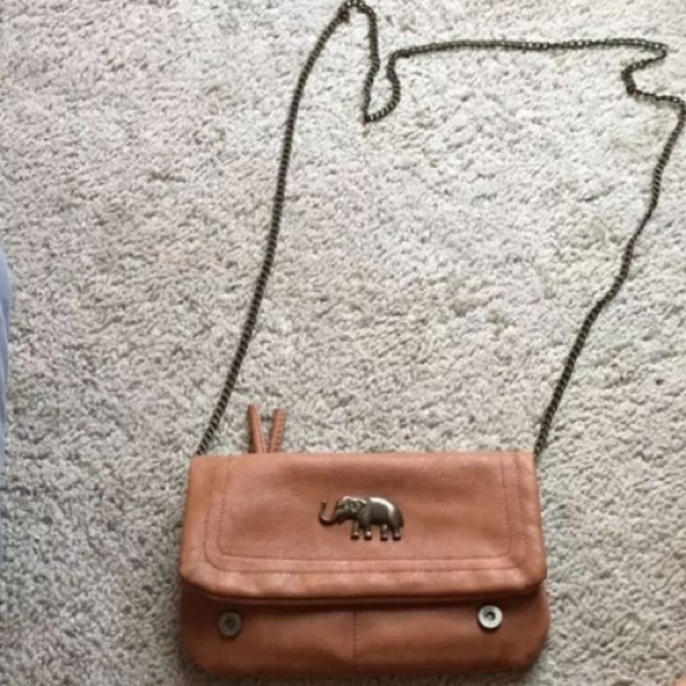 Tan leather elephant cross-body purse