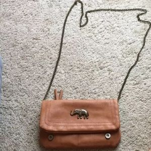 Tan leather elephant cross-body purse