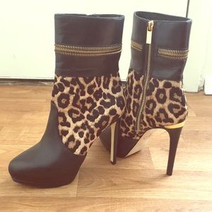 Michael Kors heeled Boots.
