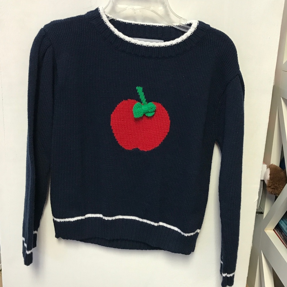 Navy sweater with apple on the front
