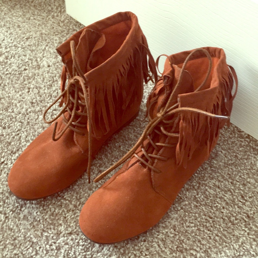 Orange fringed booties