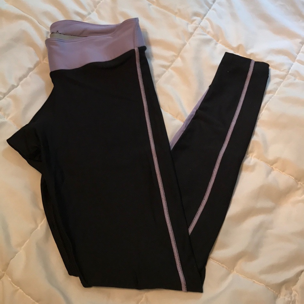 Purple and black under armor leggings