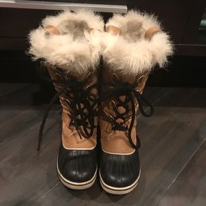 Sorel waterproof snow boots.