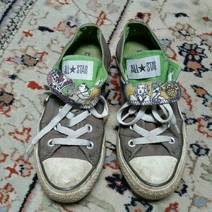 Gray Converse with pictures on the tounge