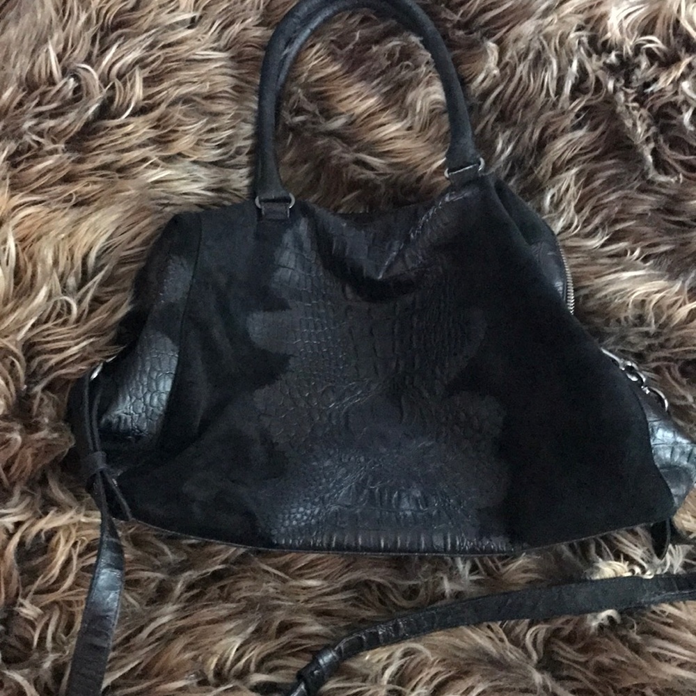 Raven kavffman couture sued and crocodile handbag