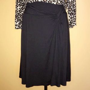 Donna Degnan black skirt (knot on the left side