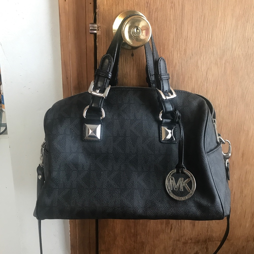 Used Black MK bag.