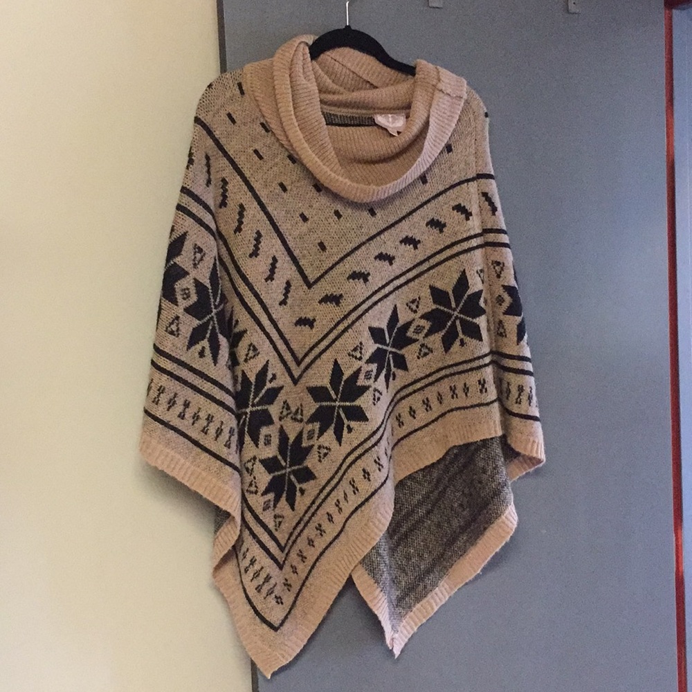 Tan and black poncho