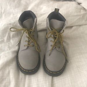 Gray timberland-style Doc Martens