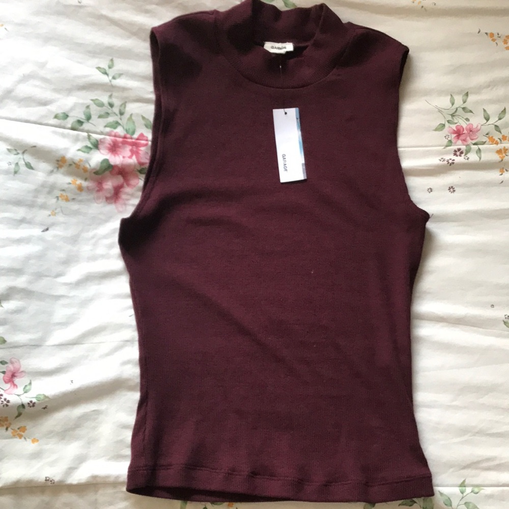 Brand new turtleneck sleeveless top